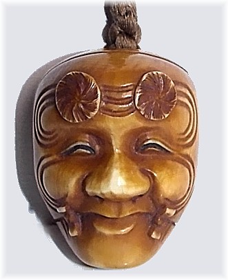 антикварная японская нецке из кости в виде маски персонажа театра НО